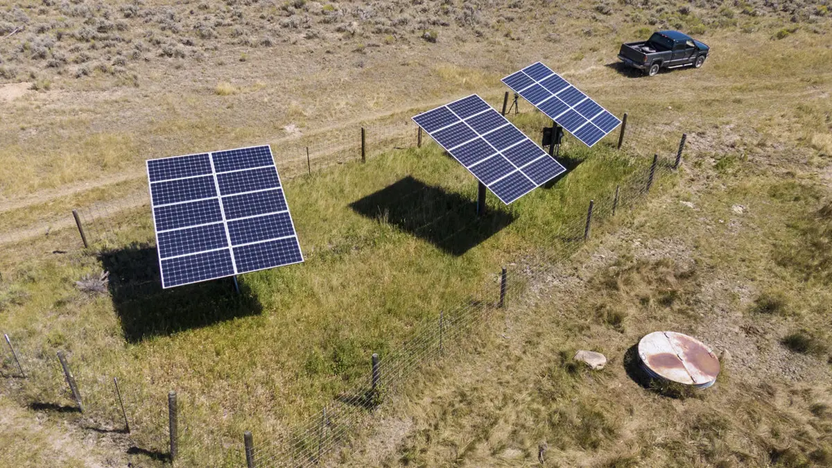 Aerial view of ground-mounted solar panels
